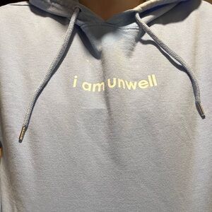 Light Blue Hoodie with 'I am Unwell' Print